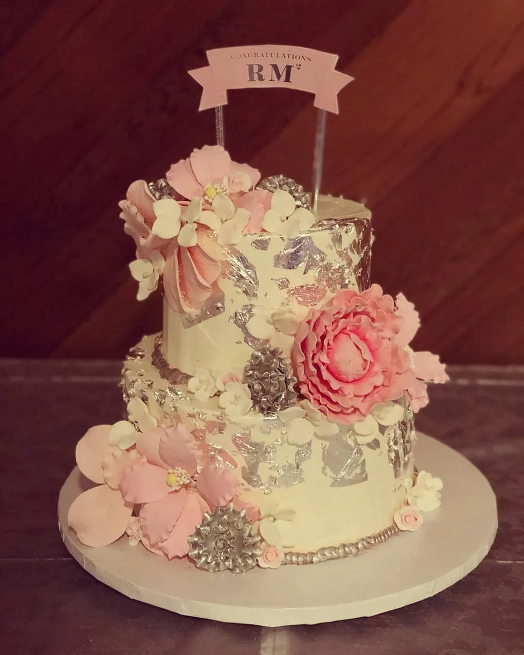 Elegant dessert tablescape with tiered stands and petit fours